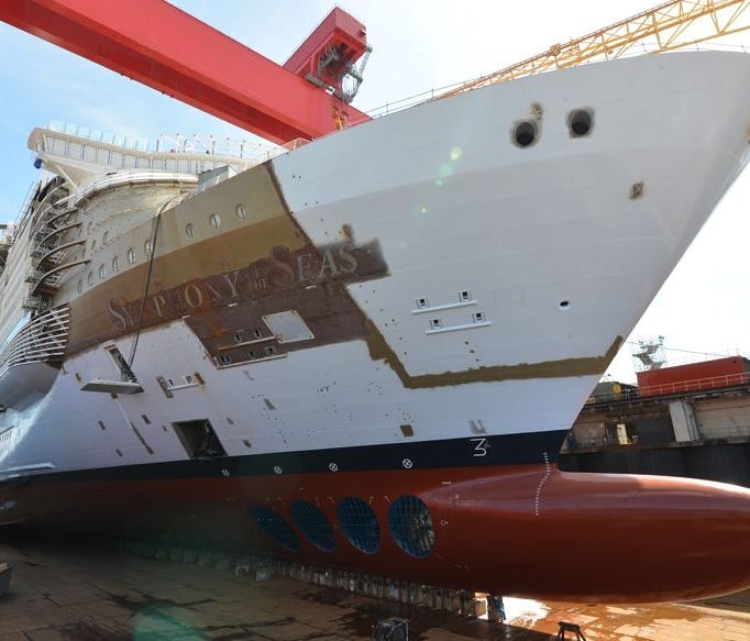 Royal Caribbean's Symphony of the Seas in a dry dock at the Saint-Nazaire, France in June 2017. Soon after this picture was taken, the dry dock was flooded, and Symphony touched water for the first time.