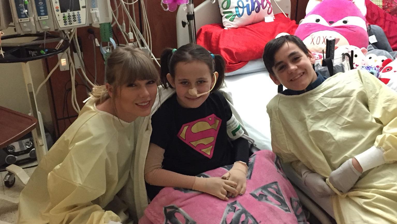 Taylor Swift promised a young burn survivor she'd see a concert. She kept that promise