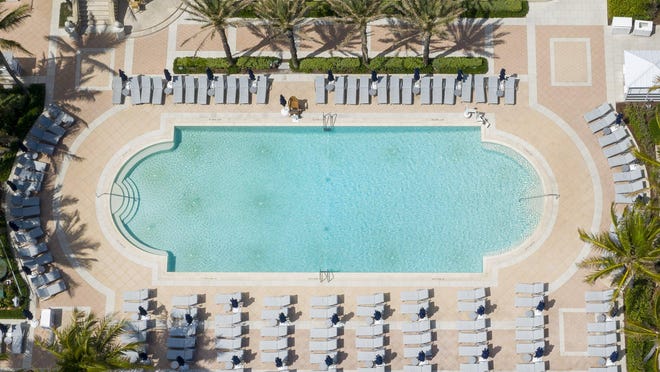 The Breakers pool is empty in March as the hotel closed its doors because of the coronavirus pandemic.