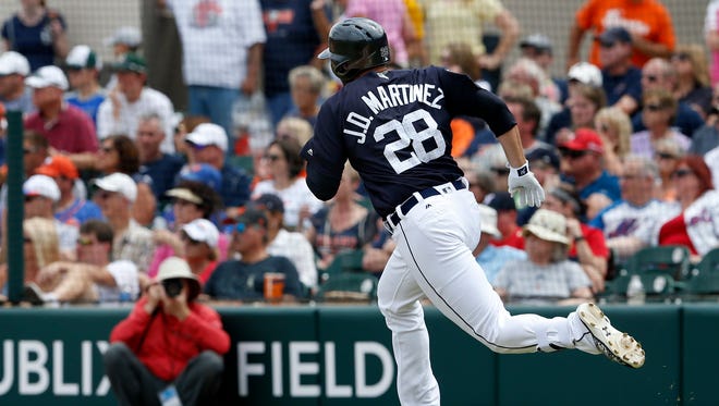 Detroit Tigers rightfielder J.D. Martinez runs to first base on a double March 12, 2017, at Joker Marchant Stadium.