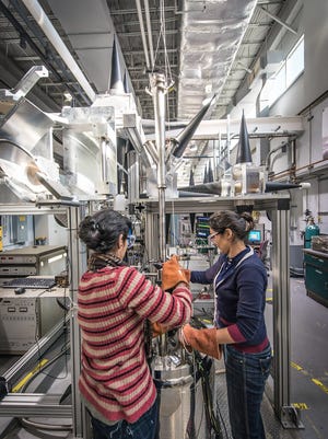 Scientists at work in the Mag Lab's Electron Magnetic Resonance Facility.