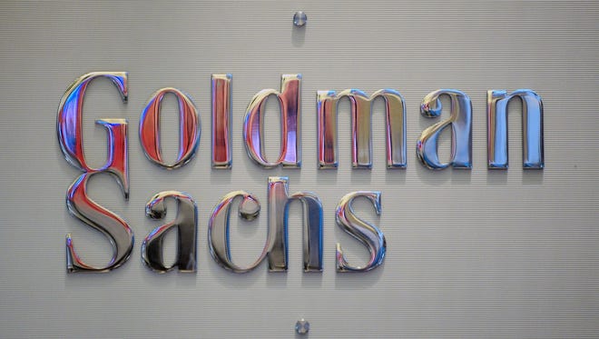 A file photo dated 19 January 2011 showing a sign at the Goldman Sachs booth on the floor of the New York Stock Exchange after the Opening Bell in New York, New York, USA.
