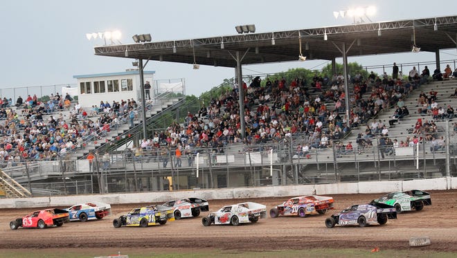Oshkosh SpeedZone Raceway drivers compete on the dirt track at the at the Winnebago County Fairgrounds in this 2012 file photo.