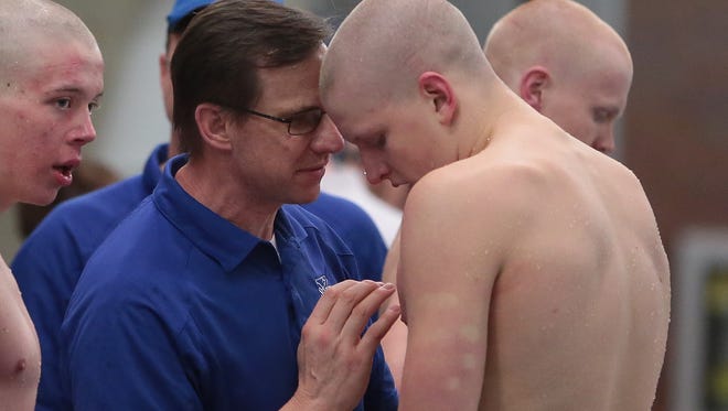 St. Xavier swimming coach Jim Brower during the state swim meet in February of 2014.