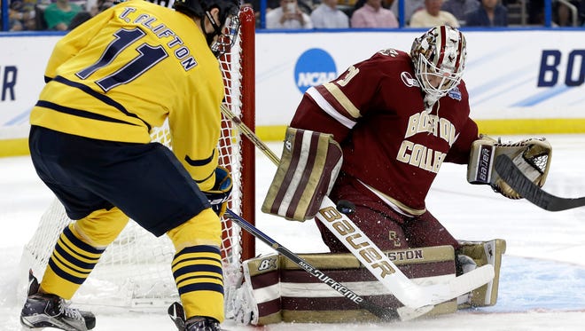 Boston College goalie Thatcher Demko (30) makes a save on a shot by Quinnipiac forward Tim Clifton (11) during the second period Thursday in Tampa, Fla.