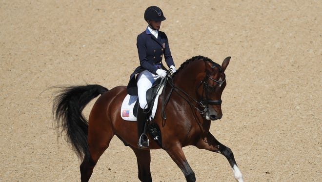Laura Graves rides Verdades during dressage individual grand prix freestyle competition in the Rio 2016 Summer Olympic Games at Olympic Equestrian Centre in Rio de Janeiro.