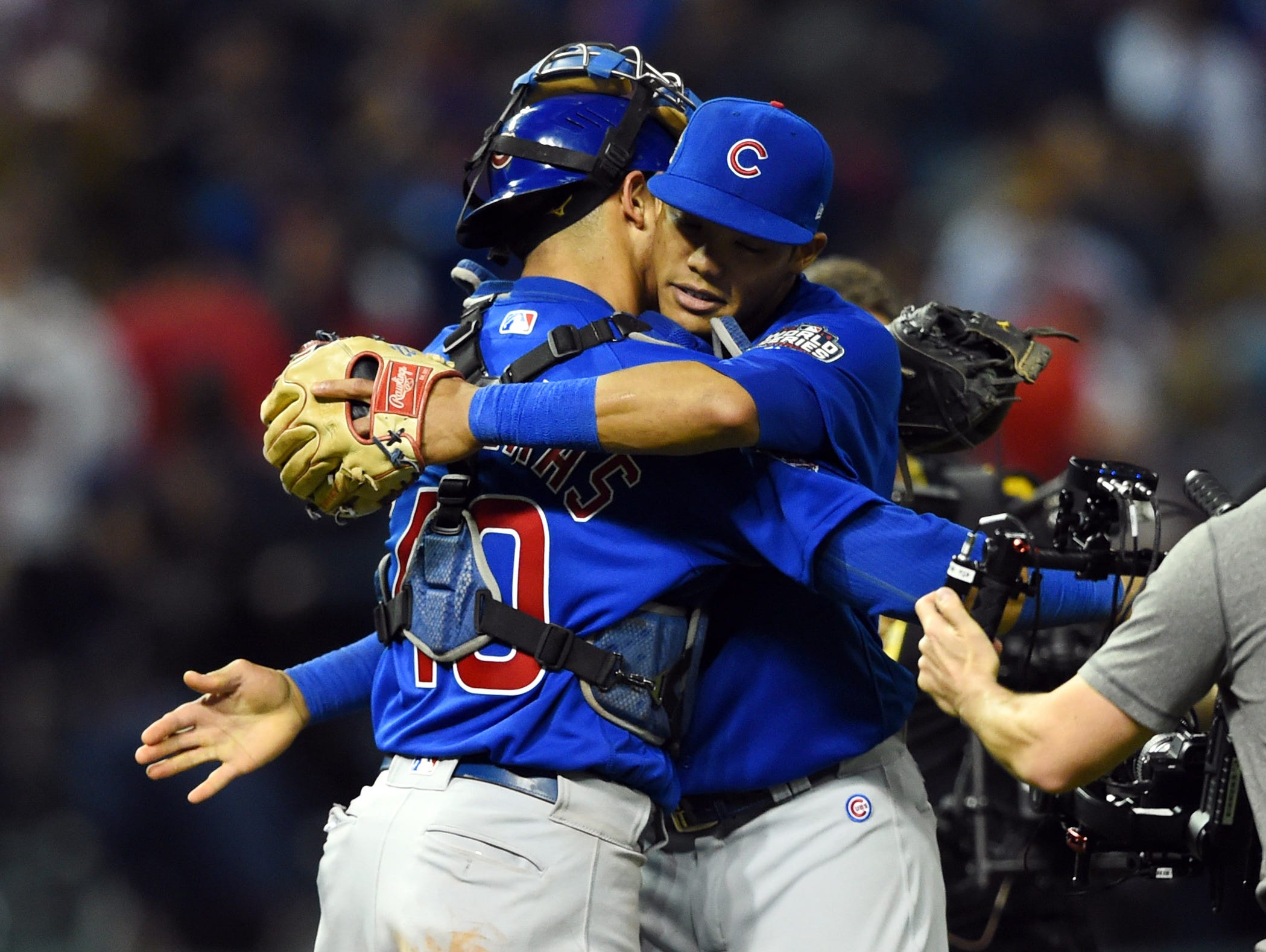 Nov 1, 2016; Cleveland, OH, USA; Chicago Cubs players Willson Contreras (40) and Addison Russell celebrate after defeating the Cleveland Indians in game six of the 2016 World Series at Progressive Field. Mandatory Credit: Tommy Gilligan-USA TODAY Spo