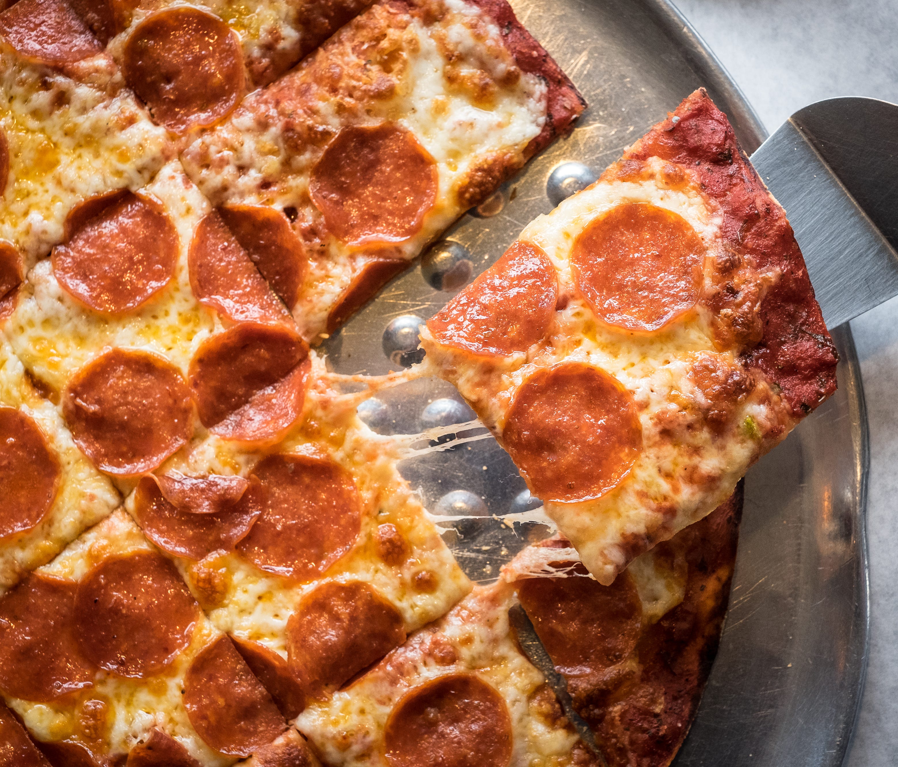 Pat's offers 11 specialty pizzas, served tavern style, and a create your own option.