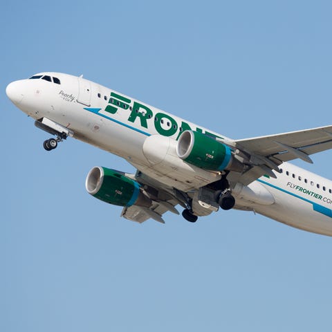 A Frontier Airlines Airbus A320neo takes off from...