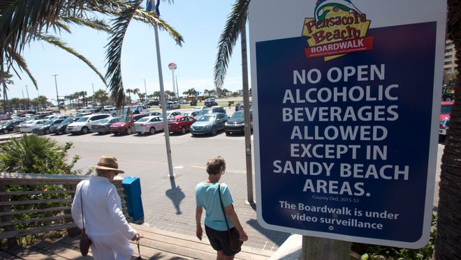 The Escambia County Commission has decided not to conduct a survey on the effects of banning open containers in the public areas of the Pensacola Beach boardwalk.