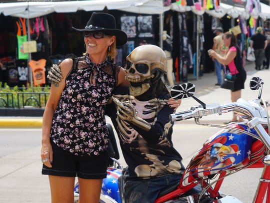 First-time Sturgis visitor Diana Voakes poses with