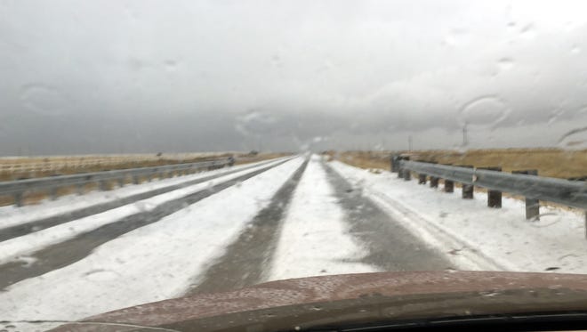 Heavy rain last week turned into hail that create conditions that felt like "driving on ball bearings," one traveler said.
