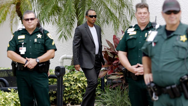 Tiger Woods arrives at the Palm Beach County courthouse on Friday.