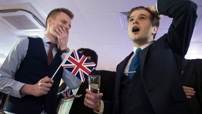 Supporters of leaving the EU celebrate at a party hosted by Leave.EU in central London as they watch results come in from around the country after Thursday's EU referendum.