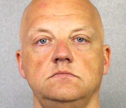 This photo provided by the Broward County Sheriff's Office shows Oliver Schmidt under arrest on Jan. 7, 2017. Schmidt, the former general manager of the engineering and environmental office for Volkswagen America, was arrested in connection with the 
