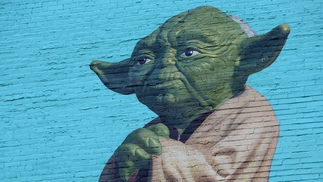 Star Wars character, Yoda, is part of ArtWorks' newest mural called 'Toy Heritage'. The mural focuses on the legacy of Kenner Toys, a Cincinnati-based toy company founded in 1947.  