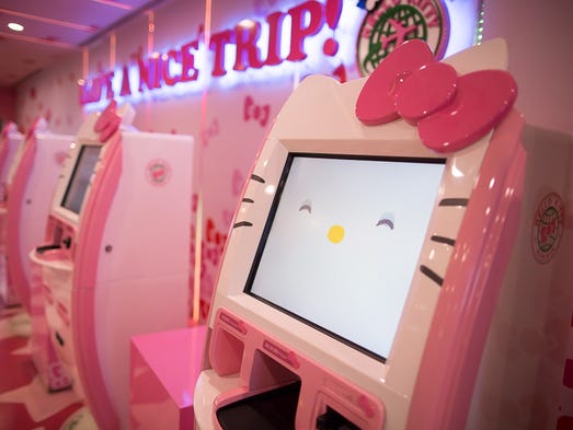 Hello Kitty's face welcomes would-be travelers at a