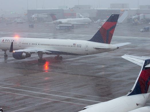 Delta Air Lines jets at airport amid wintry conditions