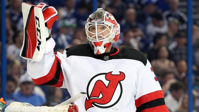 Apr 21, 2018; Tampa, FL, USA; New Jersey Devils goaltender Cory Schneider (35) reacts against the Tampa Bay Lightning during the first period of game five of the first round of the 2018 Stanley Cup Playoffs at Amalie Arena.
