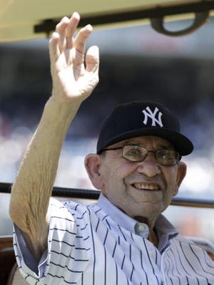 Yogi Berra turns 90 years old today. Here he is pictured in 2013 at Yankee Stadium.