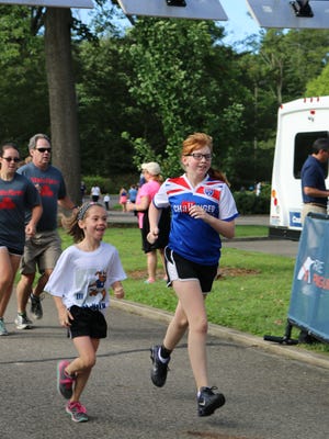 Young athletes participate in the recent “For Your Health” 5K Run/Walk.  In its tenth year, the event engaged nearly 1,600 community members at The Dawes Arboretum’s scenic grounds.