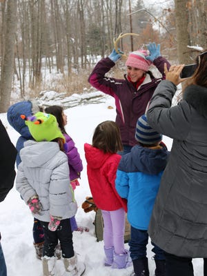 Naturalist Stephanie Queirolo teaches a group at the Great Swamp Outdoor Education Center.