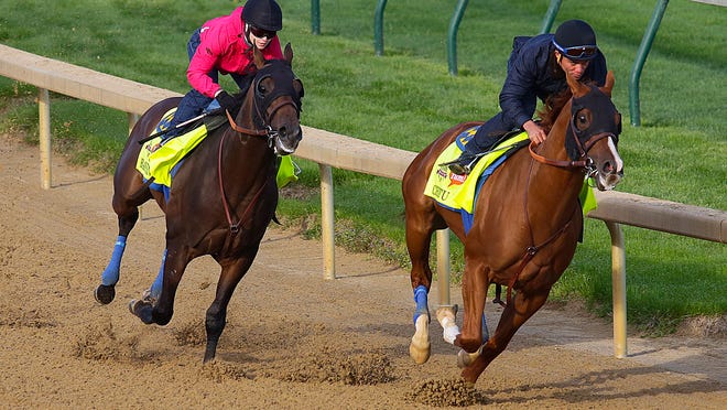 
Two of trainer Bob Baffert's possible Derby candidates, Bayen, left, and Chitu worked Monday at Churchill Downs.
