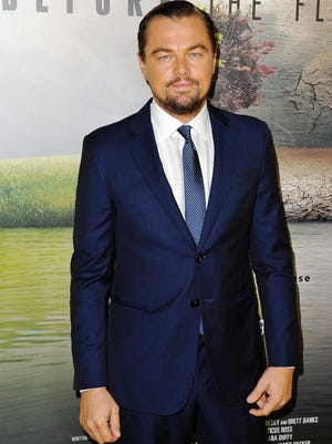 Leonardo DiCaprio is an executive producer on two new documentaries: National Geographic Channel's 'Before the Flood' and Netflix's 'The Ivory Game.'