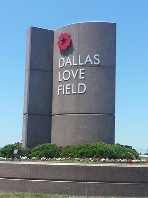 A sign welcomes travelers to Dallas Love Field.