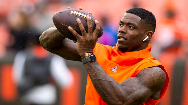 Sep 9, 2018; Cleveland, OH, USA; Cleveland Browns wide receiver Josh Gordon (12) makes a catch during warmups before the game at FirstEnergy Stadium. Mandatory Credit: Scott R. Galvin-USA TODAY Sports
