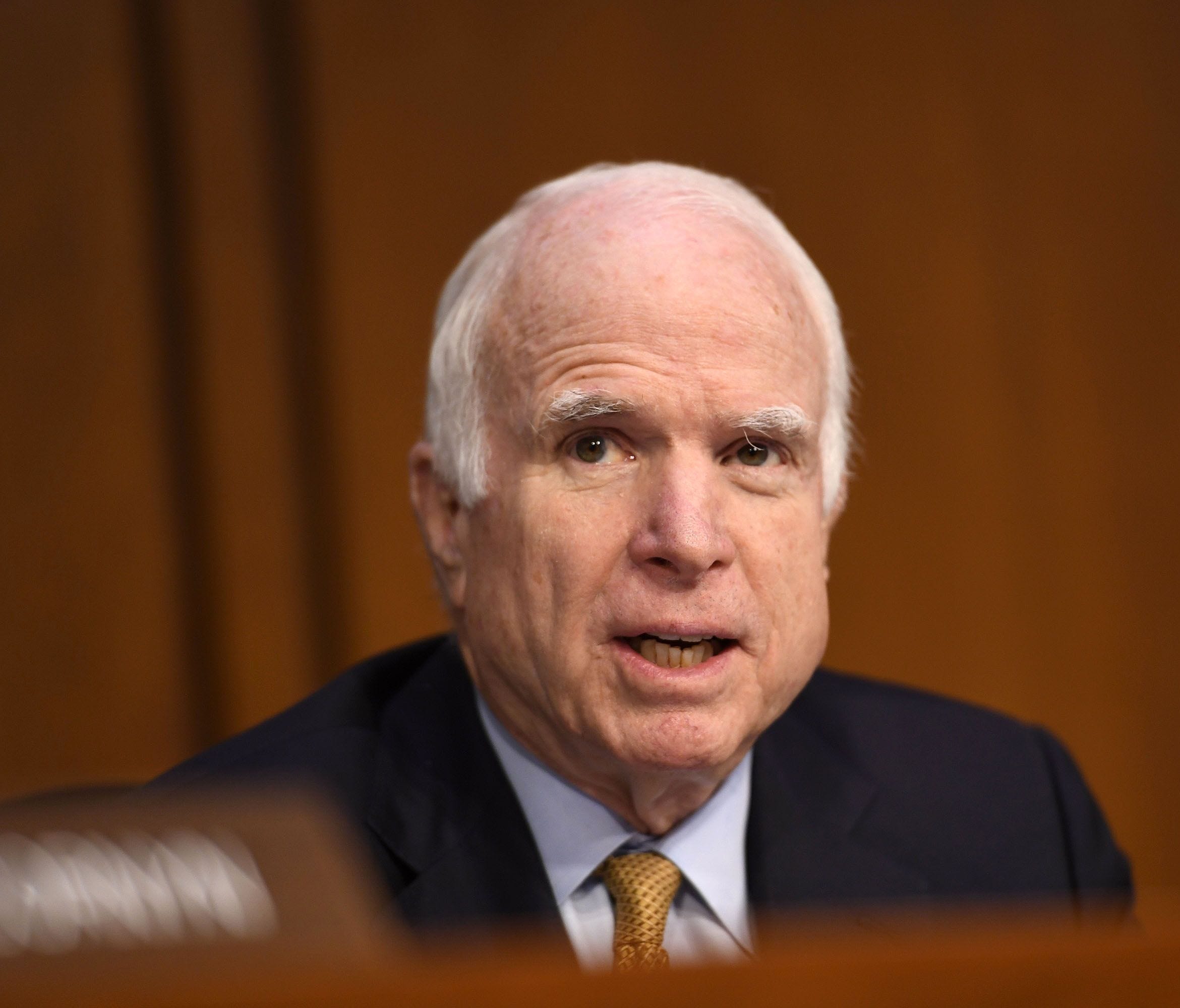 Sen. John McCain, R-Ariz., speaks as former FBI director James Comey testifies in front of the Senate Intelligence Committee in Washington.