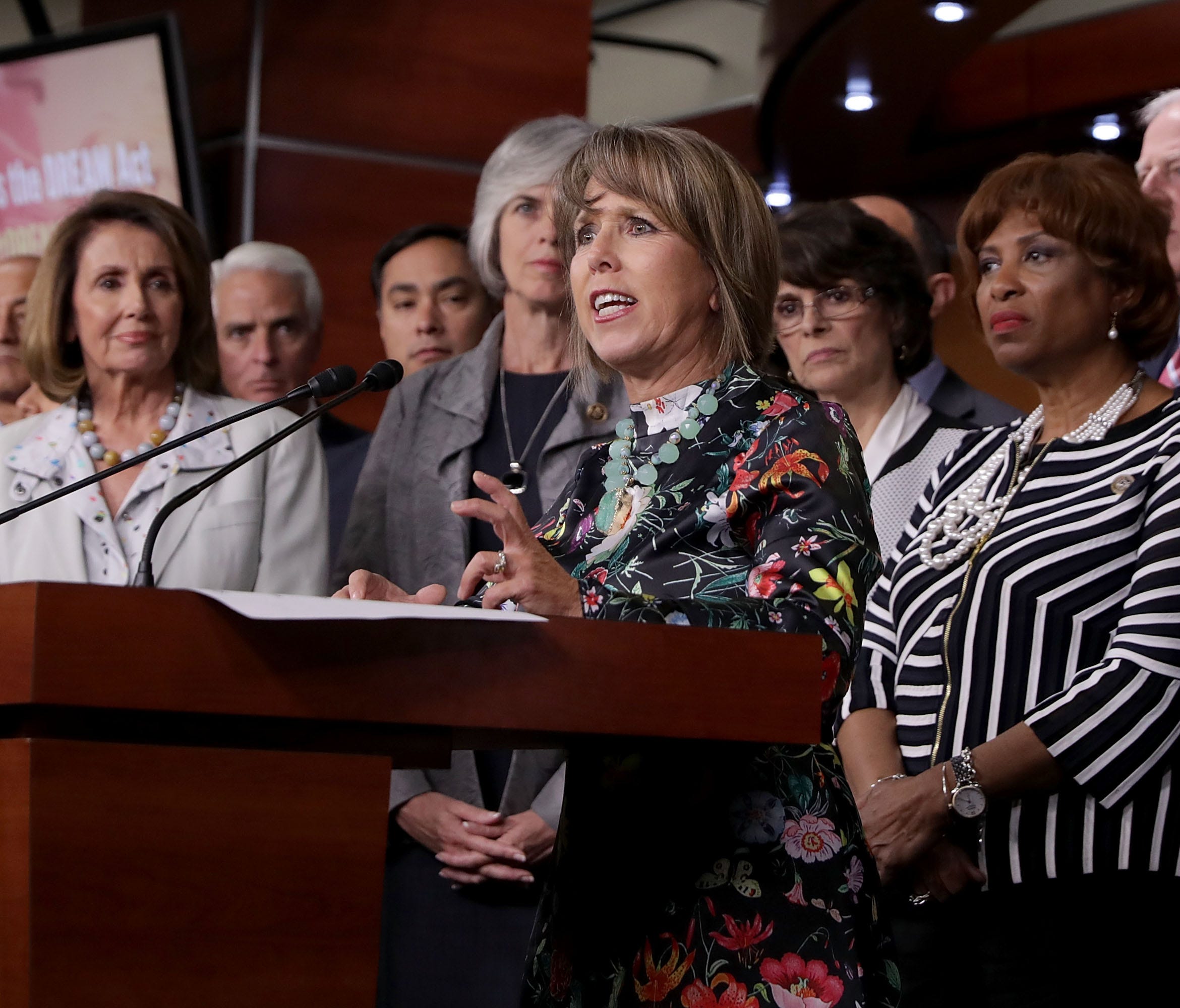 Congressional Hispanic Caucus Chairwoman Michelle Lujan Grisham is joined by about 25 fellow House Democrats to introduce a petition to force a vote on the DREAM Act during a news conference at the U.S. Capitol on Sept. 25, 2017.