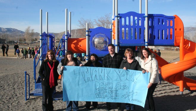 Fernley Elementary School held a special “thank you” ceremony Monday to show its appreciation to the donors and the school’s PTA for their contributions for the school’s new playground equipment. Pictured with the new equipment, while the school’s students are in the background, are, left to right, principal Chanen Cross, PTA member Heather Garcia, Debbie Gurries of Walmart, Ryan Dolan of the Dolan Auto Group and PTA members Donna Van Fleet and Teyana Peterson.
