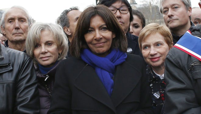 The Mayor of Paris Anne Hidalgo, joins a Unity rally Marche Republicaine on Jan. 11 in tribute to the 17 victims of the terror attacks in France.