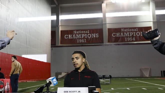 Ohio State wide receiver Gee Scott Jr. answers questions during the football signing day news conference in February in the Woody Hayes Athletic Center. Scott, like all Buckeyes players, is unable to get visits from his family during the pandemic.