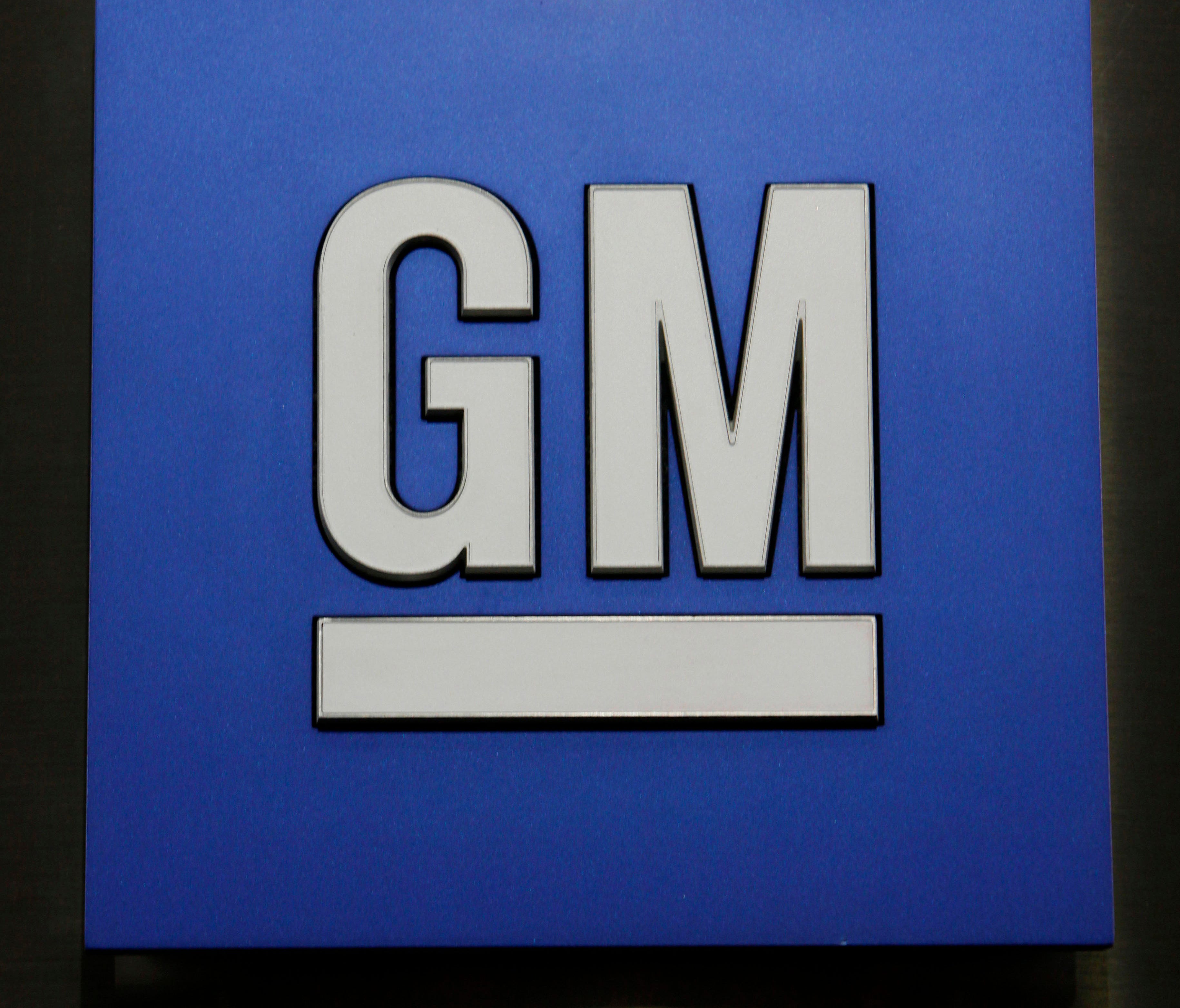 General Motors stock falls on Monday after Goldman Sachs rates the stock a sell. File photo shows GM logo.