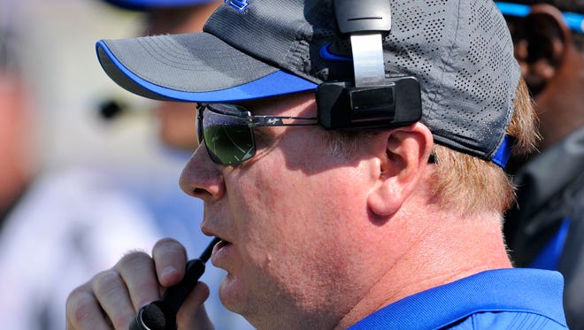 UK Coach Mark Stoops looks on from the sidelines against Ohio, Saturday, Sept. 06, 2014, at Commonwealth Stadium in Lexington.