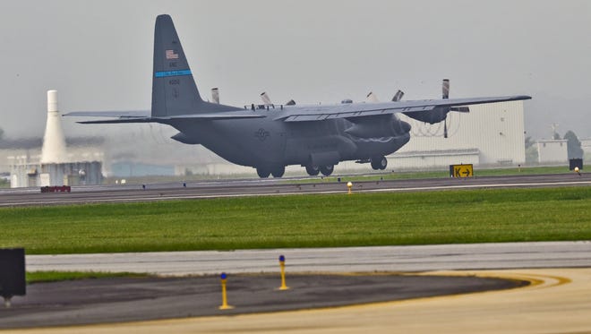 A Delaware Air National Guard C-130 takes off from the New Castle Air National Guard Base.