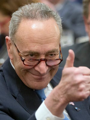 Sen. Chuck Schumer, D-N.Y., gives a thumbs-up before speaking at a New York State Association of Counties conference on Feb. 1, 2016, in Colonie, N.Y.