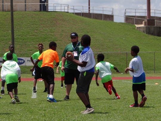 Coach Garth Brooks Preaches Love Through Football