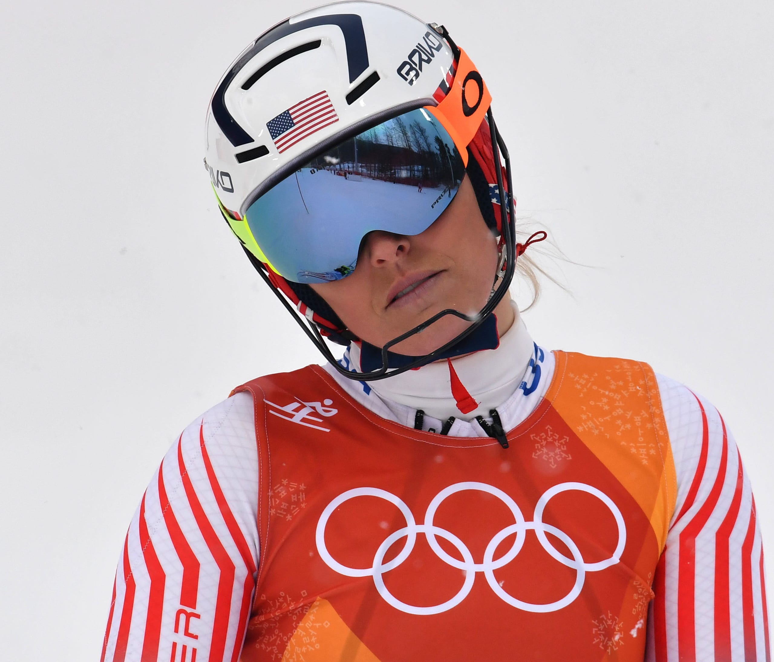 Lindsey Vonn reacts after missing a gate that would cause her not to finish the women's Alpine combined at the Olympics on Thursday.