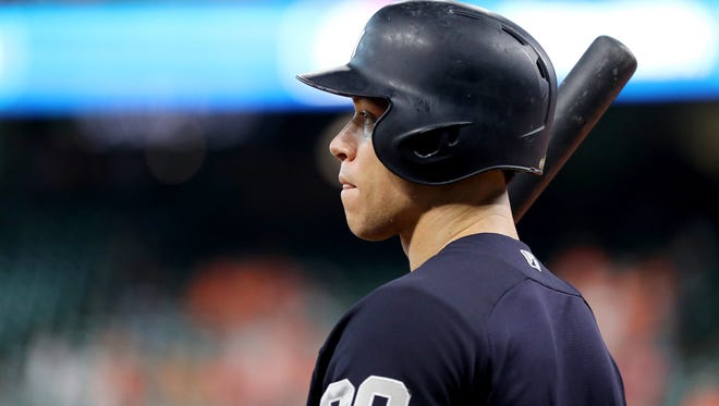 HOUSTON, TX - OCTOBER 21:  Aaron Judge #99 of the New York Yankees looks on during batting practice prior to Game Seven of the American League Championship Series against the Houston Astros at Minute Maid Park on October 21, 2017 in Houston, Texas.
