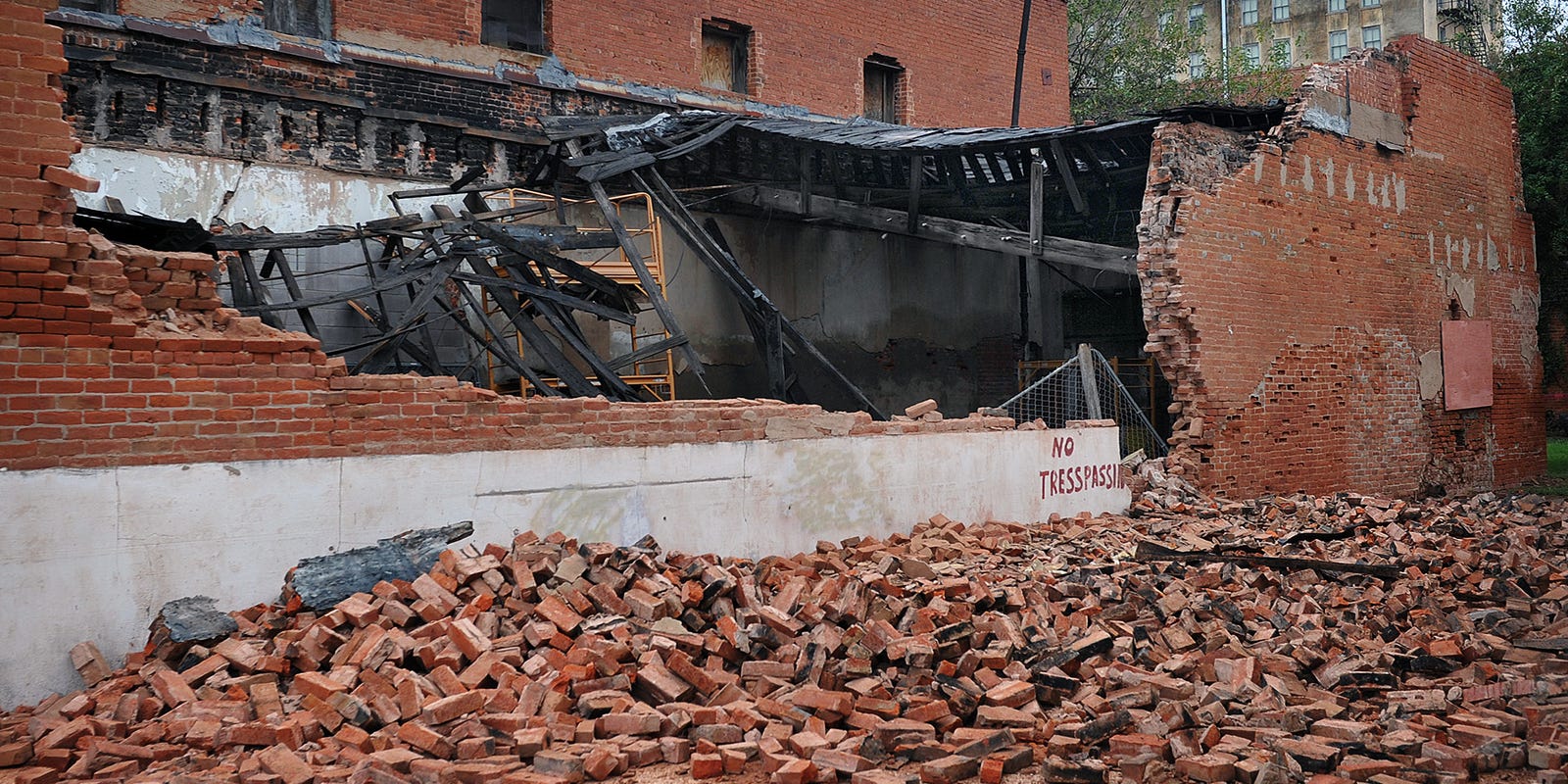 Wall of historic downtown building collapses
