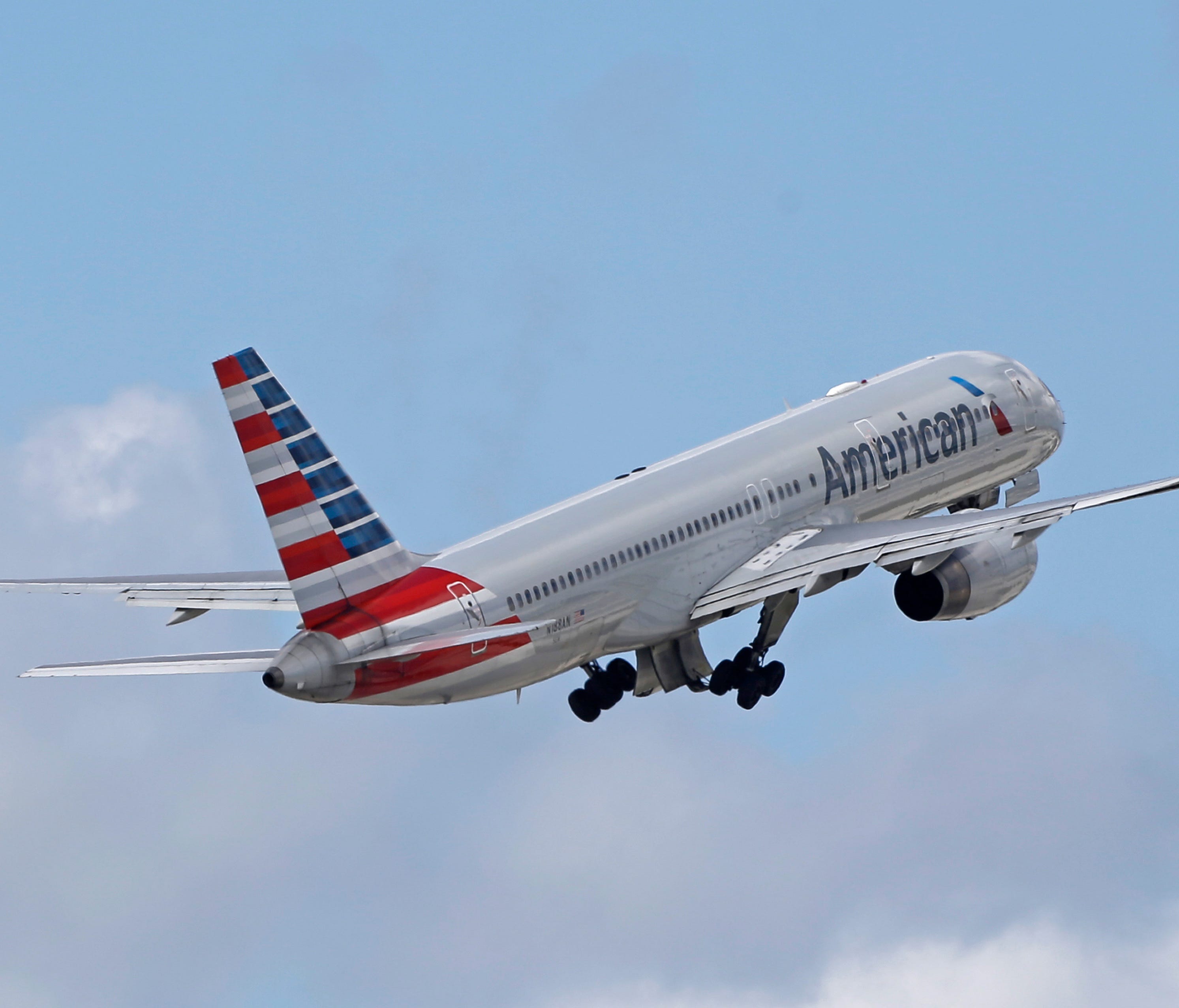An American Airlines passenger jet takes off from Miami International Airport on June 3, 2016.