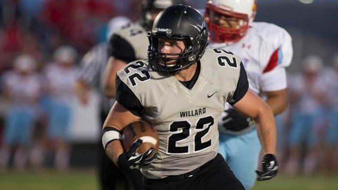 Willard's Hunter Yeargan looks for yardage in a game against Webb City on Friday night.