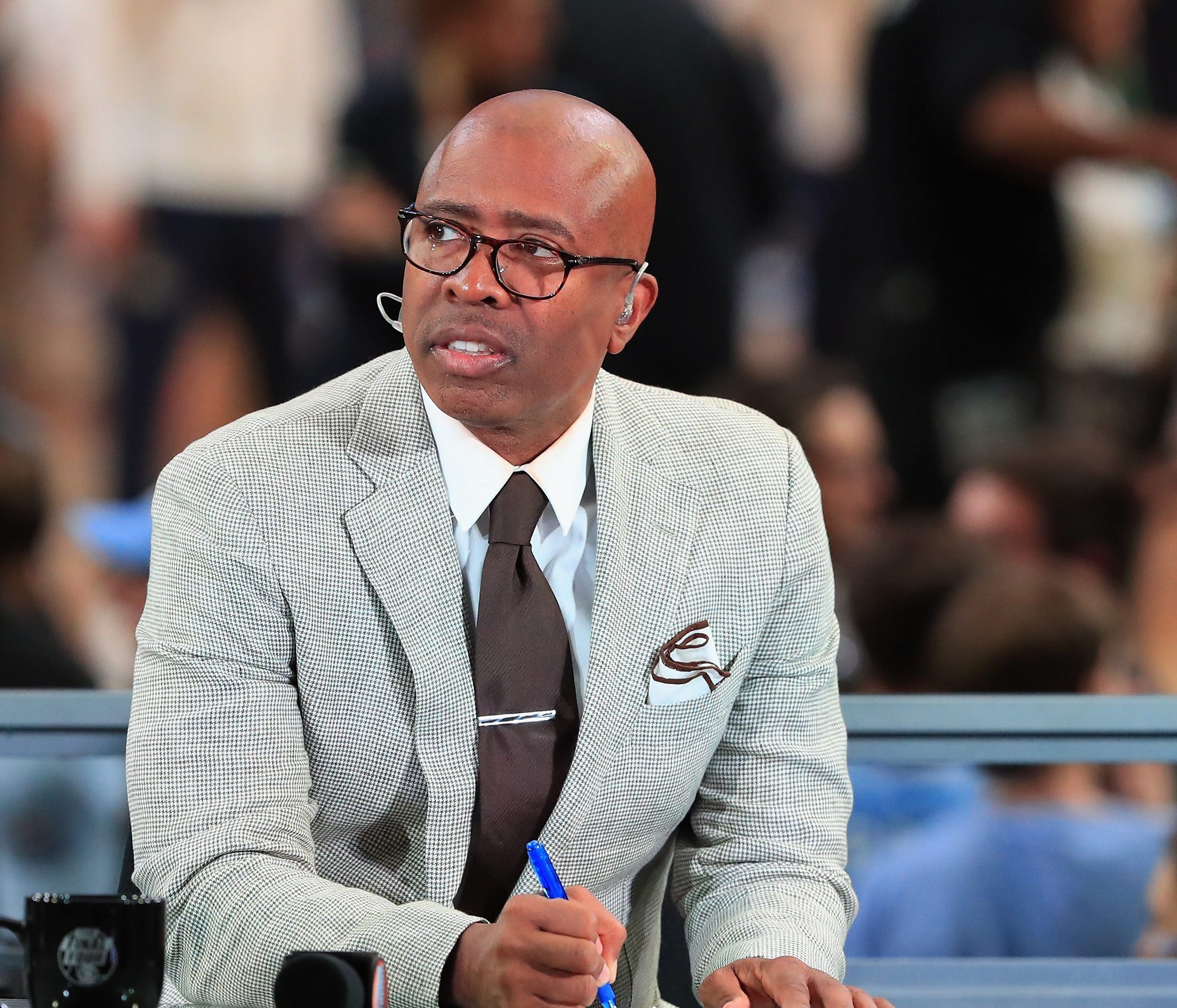 TV personality Kenny Smith looks on before the game between the North Carolina Tar Heels and the Gonzaga Bulldogs during the 2017 NCAA Men's Final Four National Championship game at University of Phoenix Stadium on April 3, 2017 in Glendale, Arizona.