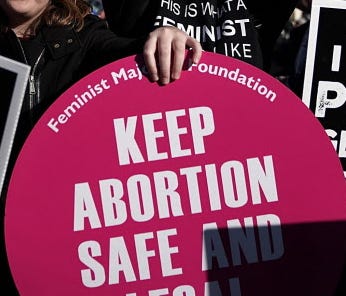 Protesters on both sides at the Supreme Court on Jan. 19, 2018.