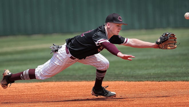 Collierville's Mitch Austin can't make the catch on an infield grounder during the Dragon's game against Rossview in the TSSAA Class AAA baseball tournament game Wednesday at Spring Fling.