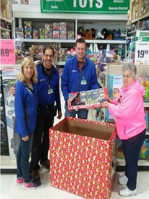 Menard's team members stand with Barb Thill, a coordinator of Fond du Lac Salvation Army's Christmas gift program. Menard's hosts a toy and gift collection box, and invite help filling it.  Other collection locations: Ascension Lutheran, FDL public library, Wink Chiropractic, Culver's on Pioneer and on East Johnson, Festival Foods, Salem United Methodist Church, St. Paul's Cathedral, Papa Murphy's, Sunny 97-7, Dental Associates, The Salvation Army Thrift Store, North Fond du Lac's Spillman Library, Silica, Fox Valley Savings Bank, Society Insurance, Shopko, FDL Convention Center, Burger King, Midwest Dental, both locations of Hometown Bank, Fleet Farm, FDL Children's Museum, and Culver's on West Johnson. Gifts and toys collected through Dec. 7.