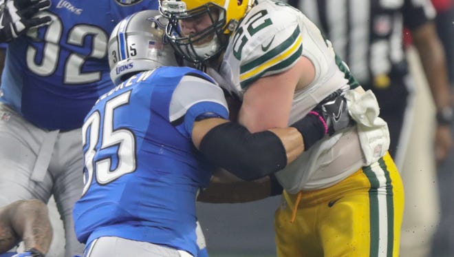 Lions safety Miles Killebrew tackles Packers fullback Aaron Ripkowski during the second half of the Lions' 31-24 loss Sunday at Ford Field.